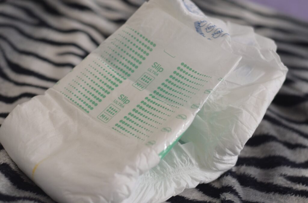 White adult disposable nappy.