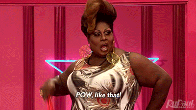 Drag Queen Latrice Royale opening a fan and saying "POW,like that!"