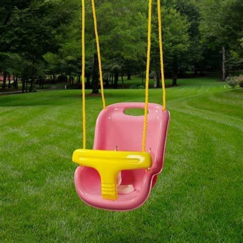 Red and yellow plastic toddler swing with safety bar.